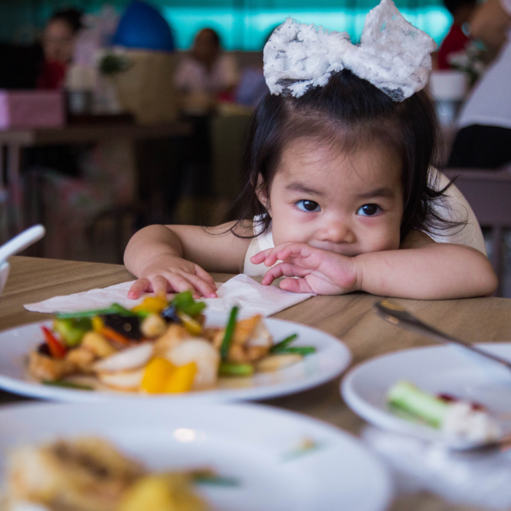 child eating out at a restaurant